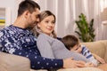 Happy family with pregnant mother at home Royalty Free Stock Photo