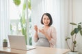 pregnancy  people and rest concept - close up of happy pregnant woman eating yogurt for breakfast at home Royalty Free Stock Photo