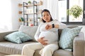 pregnant woman having labor contractions at home Royalty Free Stock Photo