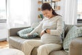 pregnant woman having labor contractions at home