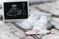 Pregnancy test positive result smiling woman, young girl happy smile in bedroom, focus on foreground 2 stripes