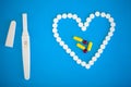 Pregnancy test. The result is positive with two strips. Treatment of infertility with pills, help in conceiving a child. Tablets
