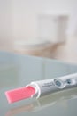 Pregnancy testing kit in bathroom Royalty Free Stock Photo