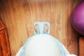 Pregnancy weight gain woman. Happy pregnant woman standing on weight scales. Therapy, healthcare, motherhood concept. Royalty Free Stock Photo