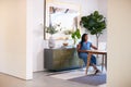 Pregnant African American Woman Using Laptop At Table Working From Home Royalty Free Stock Photo