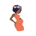 Pregnant African Woman Wearing Floral Wreath And Orange Polka-dot Dress.