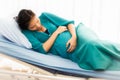 Pregnant women Asian women embrace their tummy near birth