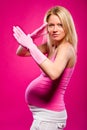 Pregnant attractive woman indoors