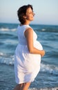 Pregnant beach walking female relaxing Royalty Free Stock Photo