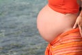 Pregnant belly at beach Royalty Free Stock Photo