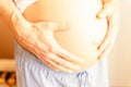 Pregnant belly hands. Happy pregnancy woman and husband hugging pregnant belly. Concept maternity, pregnancy, childbirth Royalty Free Stock Photo