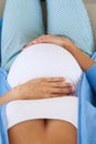 Pregnant belly in third trimester Royalty Free Stock Photo