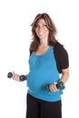 Pregnant blue top lifting weights