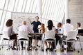 Pregnant Businesswoman Leads Boardroom Meeting Royalty Free Stock Photo