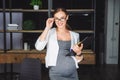 Pregnant businesswoman. Pregnant mature businesswoman working at office Royalty Free Stock Photo