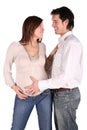 Pregnant couple embrace