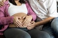 Pregnant couple feels love and relax at home Royalty Free Stock Photo