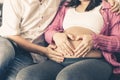 Pregnant couple feels love and relax at home Royalty Free Stock Photo