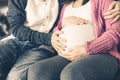Pregnant couple feels love and relax at home Royalty Free Stock Photo