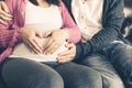 Pregnant couple feels love and relax at home. Royalty Free Stock Photo