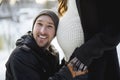 Pregnant couple have fun in winter nature Royalty Free Stock Photo