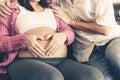 Pregnant couple feels love and relax at home Royalty Free Stock Photo