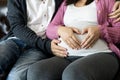 Pregnant couple feels love and relax at home Royalty Free Stock Photo