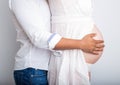 Pregnant couple in love with baby belly