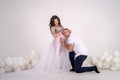 Pregnant couple. Man kissing his beautiful wife in belly. Waiting for a baby Royalty Free Stock Photo