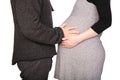 Pregnant couple in woolen dresses Royalty Free Stock Photo