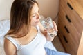 Pregnant drinking water. Young pregnancy mother drink water. Pregnant lady waiting of baby. Glass of water. Concept Royalty Free Stock Photo