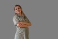 Pregnant female doctor or nurse stay in uniform with stethoscope and looks at camera smiling. Woman who is professional and future Royalty Free Stock Photo
