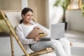 Pregnant Female Doing Online Shopping With Laptop And Credit Card At Home Royalty Free Stock Photo