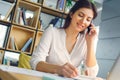 Pregnant business woman working at office motherhood sitting phone call Royalty Free Stock Photo