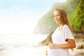 Pregnant girl on a beach Royalty Free Stock Photo