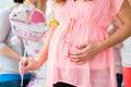 Pregnant girl celebrating baby shower party with friends Royalty Free Stock Photo