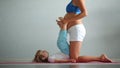 Pregnant girl doing yoga home morning