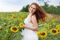 Pregnant girl in the field with sunflowers Royalty Free Stock Photo