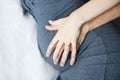 Pregnant girl. Gentle touch. Motherhood. Royalty Free Stock Photo