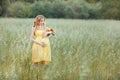 Pregnant girl rocks to sleep a toy-rabbit Royalty Free Stock Photo