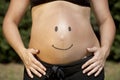 Pregnant girl with a smile