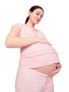 Pregnant girl touchs belly Royalty Free Stock Photo