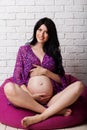 Pregnant girl is wearing purple underwear Royalty Free Stock Photo