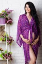 Pregnant girl is wearing purple underwear Royalty Free Stock Photo