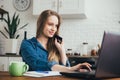 Pregnant girl works at home in self-isolation mode in quarantine and makes online purchases Royalty Free Stock Photo