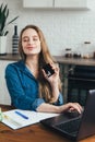 Pregnant girl works at home in self-isolation mode in quarantine and makes online purchases Royalty Free Stock Photo