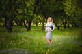 Pregnant happy Woman touching her belly. Pregnant middle aged mother portrait, caressing her belly and smiling close-up. Healthy P Royalty Free Stock Photo