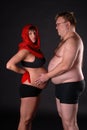 Pregnant lady with fat man Royalty Free Stock Photo