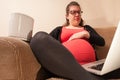 Pregnant lady laptop
