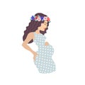 Pregnant Latin American Woman Wearing Floral Wreath And Polka-dot Dress.